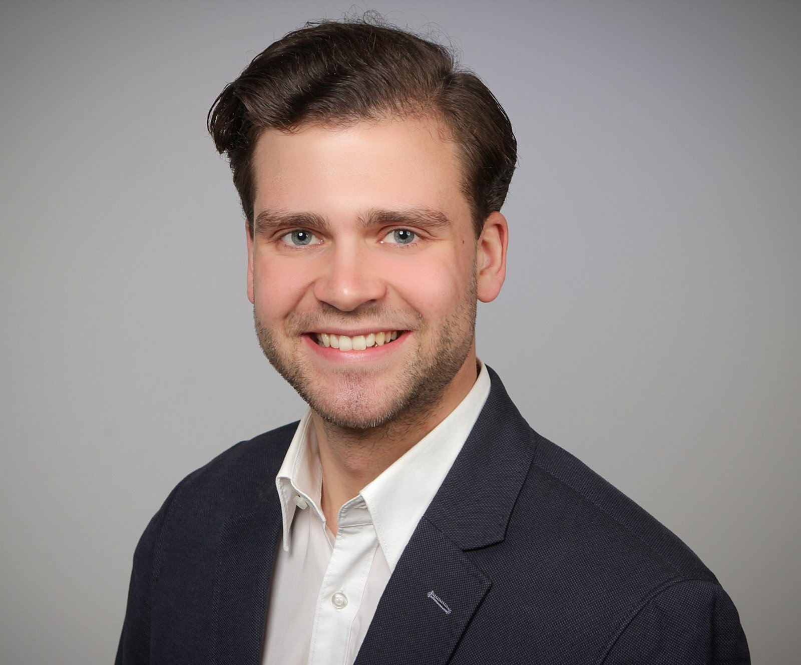 Dr. Tobias Hauser